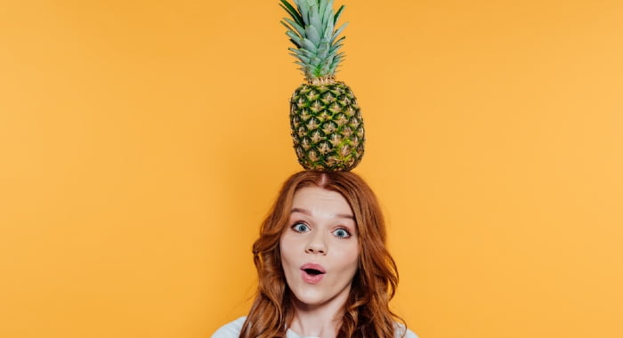 Just like the name indicates, doing a pineapple on your hair is simply to put it above your head to avoid crushing it.