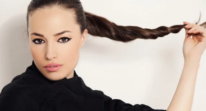 If you do a normal ponytail and add extra hair bands in every inch of it, it will help to preserve its shape.