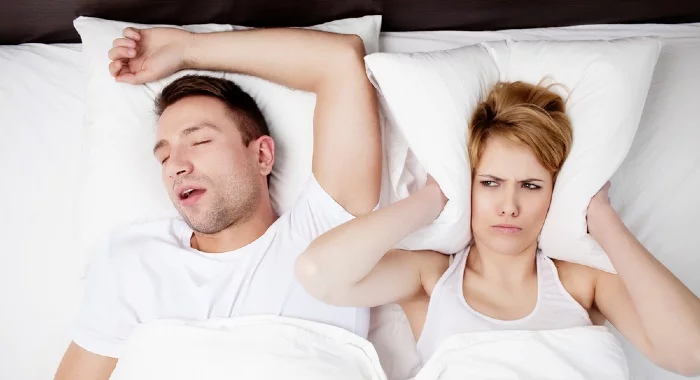 Sleeping on your back can help your sciatica but it will make your snoring worse.
